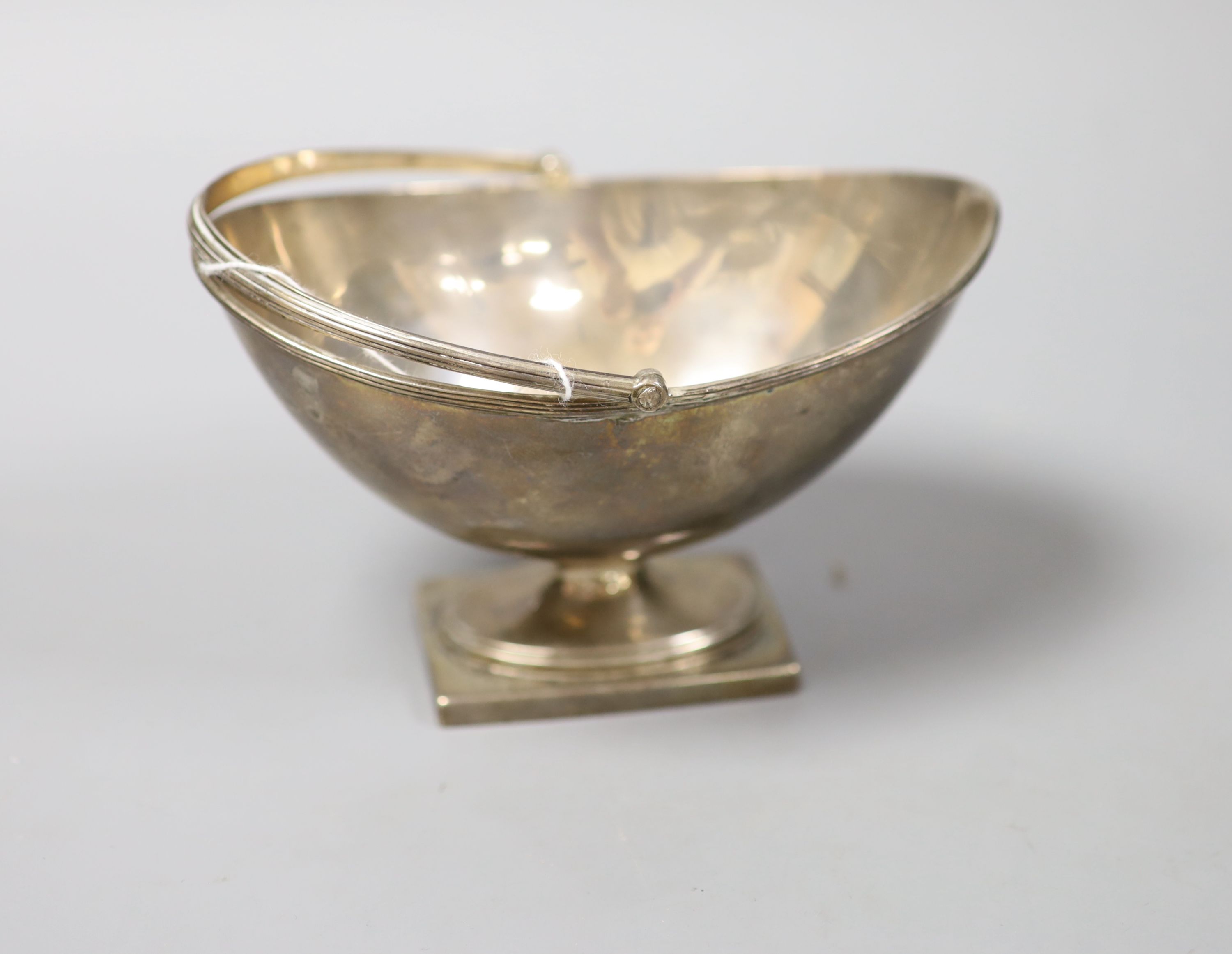 A George III silver boat shaped pedestal sugar basket, Robert Hennell, London, 1784